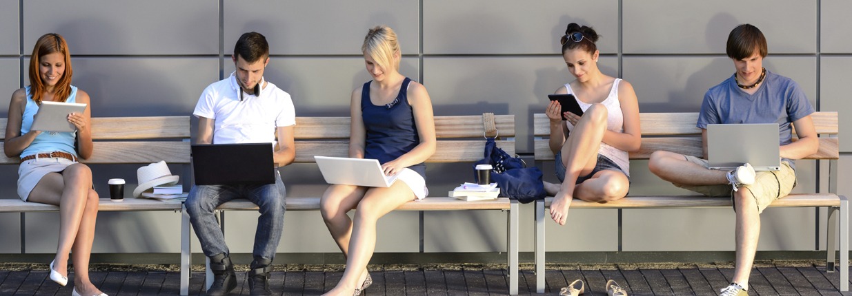 stock-photo-cropped-students-internet-computer-addiction-sitting-bench copy Dapper Goat Social Media jobs
